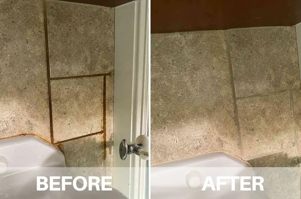 Before and after: stone-look wall tiles beside a bath with orange-brown stained grout on the left and clean grout on the right
