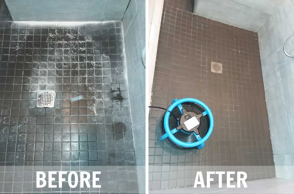 Before and after: dark mosaic shower floor with a white film of soap scum on the left and a clean, dark floor on the right